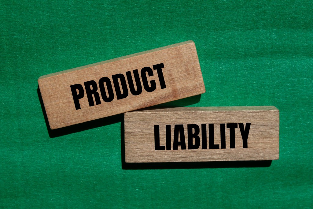 product liability words written wooden blocks with green background